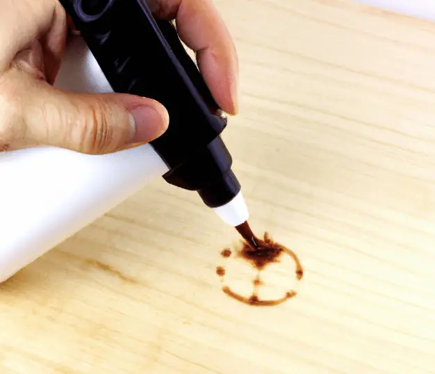 Remove permanent marker from wood